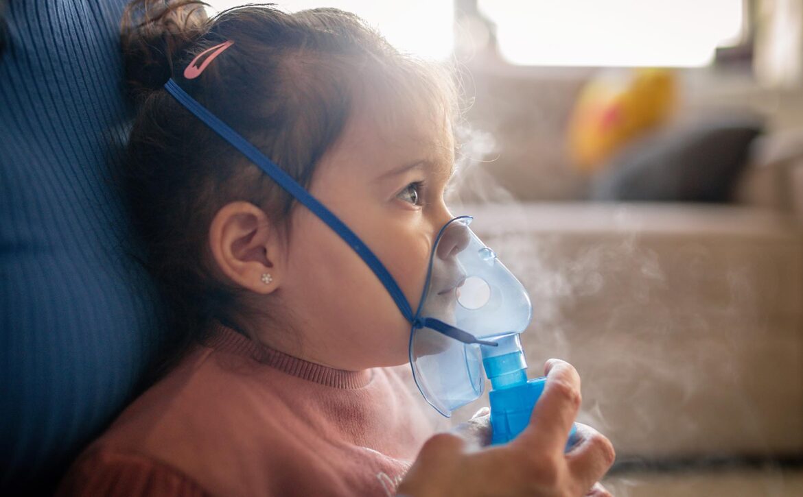 The woman and her daughter use an inhaler.